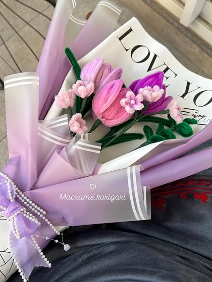 Holding the Korean-style flower bouquet. This new craft is something we're excited to explore, bringing fresh and trendy designs to our collection.