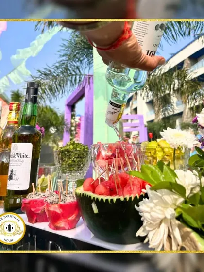 A summer favorite! We serve watermelon chunks in a hollowed-out watermelon and create a refreshing Watermelon Splash cocktail right at the bar.