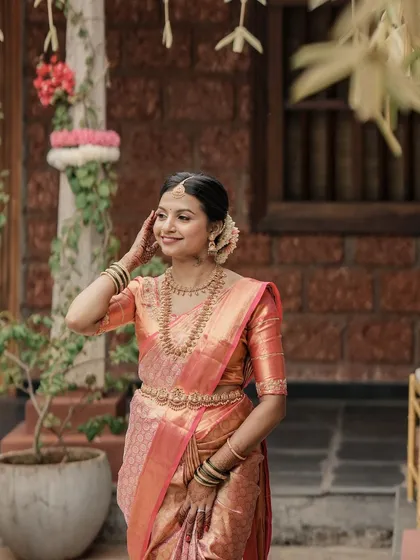 This bride looks effortlessly elegant. The makeup is natural and fresh, perfect for a daytime wedding ceremony.