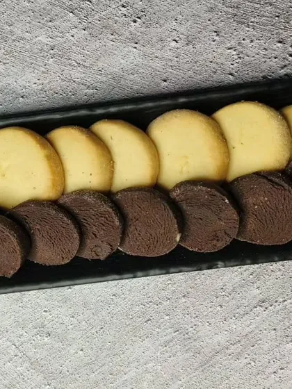 A tray of classic and chocolate shortbread cookies. These buttery, melt-in-your-mouth cookies are a must-learn recipe.