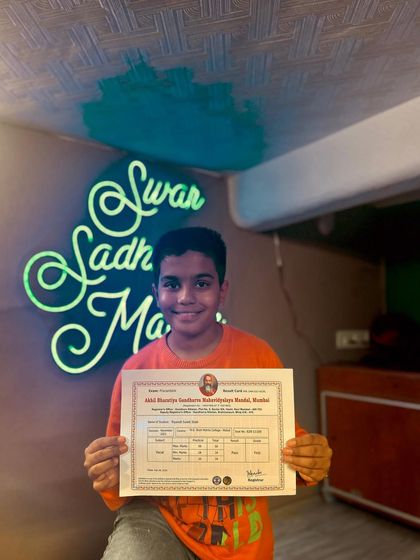 Another happy student who has successfully cleared his music exam. We celebrate every single achievement of our tribe.