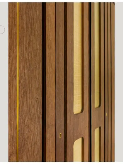 A close-up of the grooved veneer paneling, a small detail that makes a big impact.