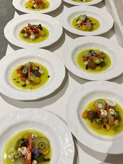 A lineup of tomato aguachile, a refreshing and spicy Mexican appetizer. The vibrant colors are a feast for the eyes.