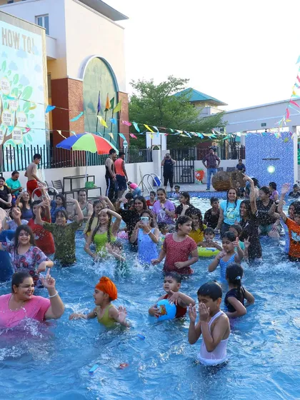 Our summer camp isn't just about dance steps, it's about making memories! The pool party is always a huge hit with the kids and their families, a perfect way to cool down and have fun.