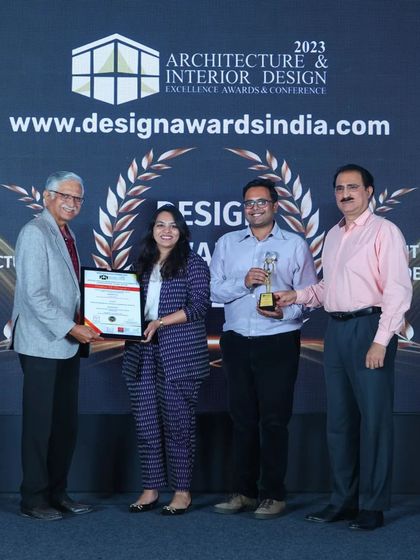 Receiving our award on stage at the 2023 Architecture & Interior Design Excellence Awards. We are grateful for the opportunity and the recognition from esteemed members of the architectural community.