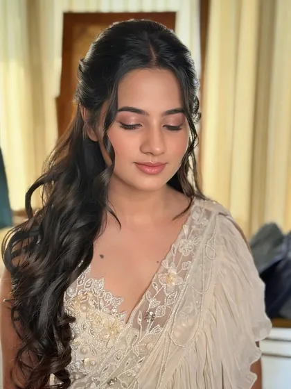 An example of my minimalist makeup philosophy, where less is truly more. This close-up highlights a soft, rosy eyeshadow, naturally defined brows, and a subtle lip tint, creating an effortlessly elegant look for a daytime wedding event.