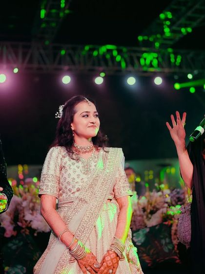 A candid moment of interaction with the couple on stage. I believe in making a real connection, asking them questions and sharing their story with the guests in an engaging way.