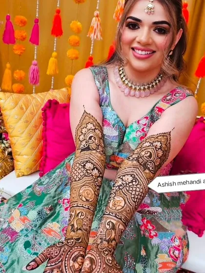 Another shot of the beautiful bride, showcasing the detail and artistry of her henna.