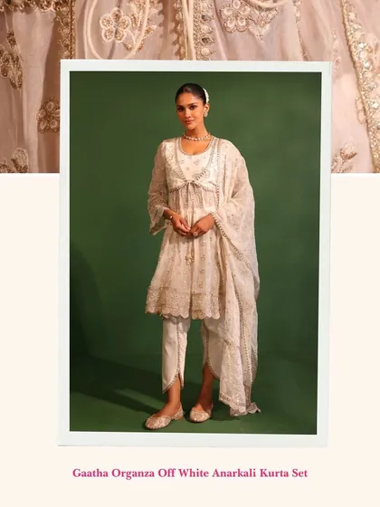 The Gaatha Organza Off White Anarkali is pure elegance. The delicate embroidery and flattering silhouette make it a perfect choice for a sophisticated festive look.