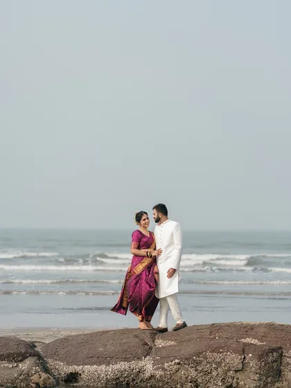 For destination weddings, the location is a key character in the story. This portrait frames the couple against the vastness of the ocean, symbolizing a love that is just as endless and beautiful, showcasing our expertise in destination wedding photography.