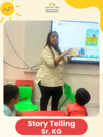 Here I am using our smart board to enhance the storytelling experience. Visual aids combined with expressive narration help children to better understand the story and its characters, making the lesson more impactful.