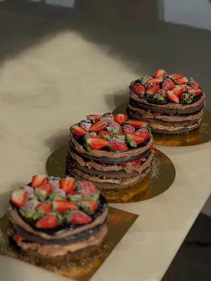 A trio of our mini layered chocolate and strawberry cakes. These are perfect for small gatherings or when you want to try a few different things.