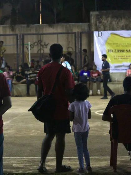 A father and daughter watching the game together. Our tournaments are a place for the whole family.