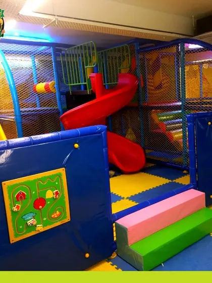 This image showcases some of the interactive elements built into the soft play structure, providing sensory engagement for kids as they play.