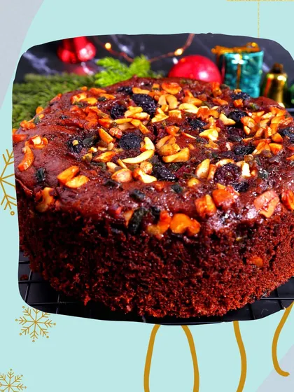 This premium Christmas plum cake is completely eggless and alcohol-free, making it a treat everyone can enjoy. It's a rich, celebratory cake perfect for your festive centerpiece.