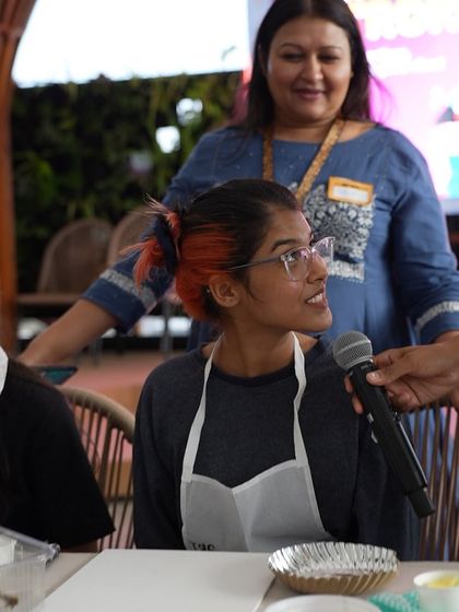 An instructor interacting with a participant during the Meesho workshop. We foster a friendly and interactive atmosphere.