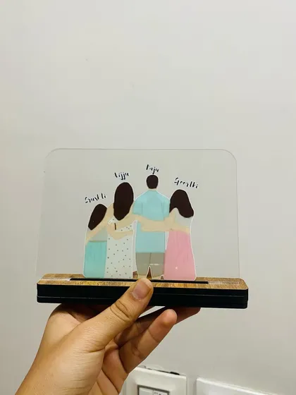 A slightly different angle of the family standee, held in hand to show its size and sturdy construction. It’s a constant reminder of the love that holds your family together.