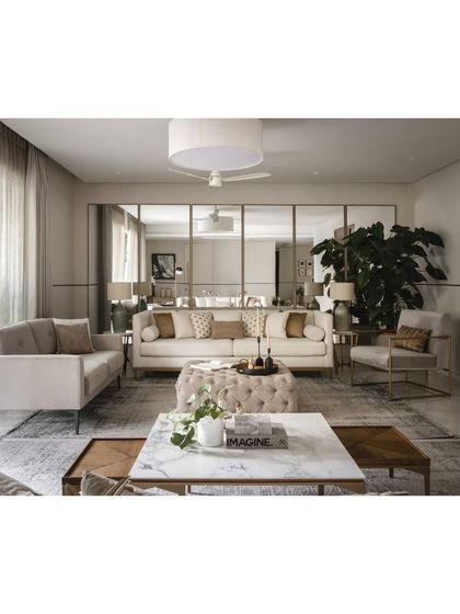 A complete view of the living room, a perfect example of contemporary elegance and comfort.