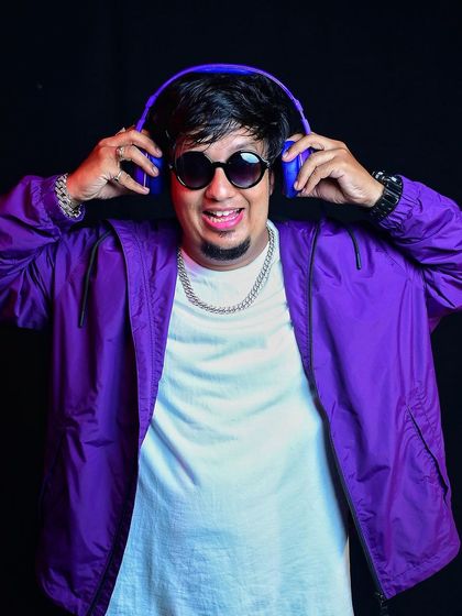 A colorful shot with headphones, reflecting my positive energy. I believe in succeeding against the odds and proving doubters wrong.