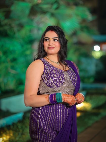 A candid shot of a guest enjoying the wedding festivities.