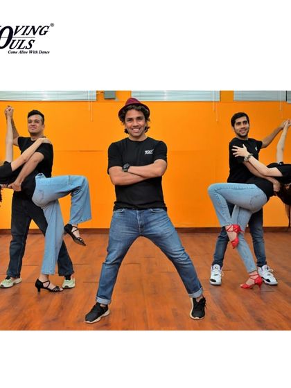 Our instructor stands proud with his students, who are mastering a challenging dip. We celebrate every achievement, big or small.