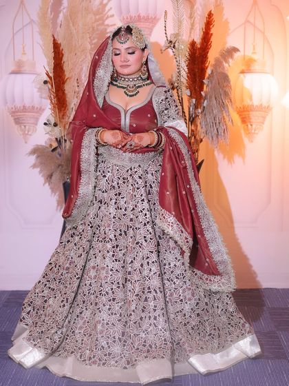 The full-length view of this magnificent bridal look. The combination of velvet and intricate embroidery is pure royalty.