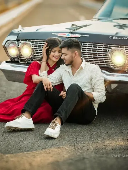 A classic love story with a vintage Chevrolet. The combination of the iconic car and the couple's romantic poses creates a timeless and cinematic pre-wedding photograph.
