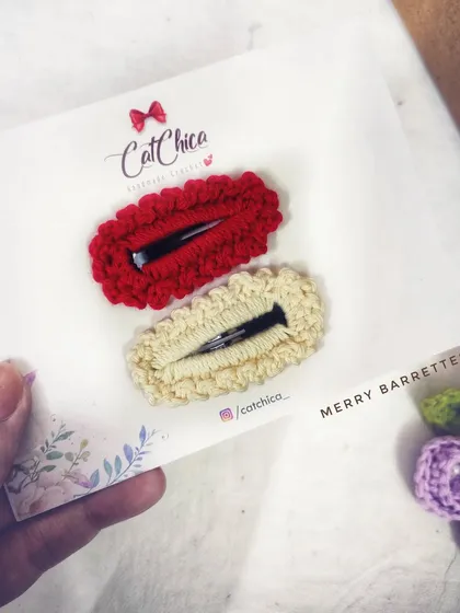 A pair of our 'Merry Barrettes' in festive red and cream. These are perfect for holiday outfits.