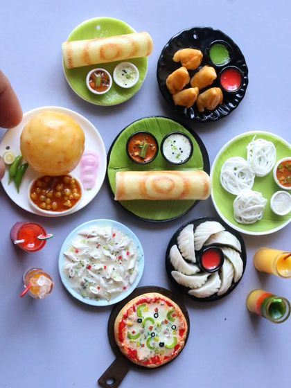 A collection of my most popular miniatures, including pizza, momos, and chole bhature.