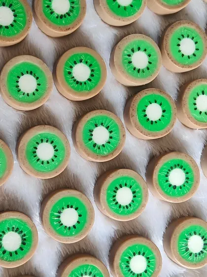 Realistic-looking kiwi-slice soaps, a unique and fruity-themed favor for any party.