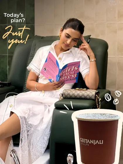 Your appointment is your time to recharge. Here, a client enjoys a relaxing pedicure while catching up on some reading. It's the perfect solo escape to unplug and focus on yourself.