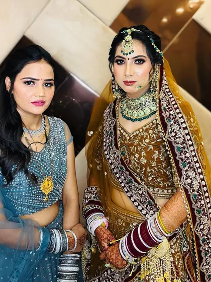 A picture of me with one of my beautiful brides. It's always an honor to be a part of such a special day and help my clients feel their absolute best.