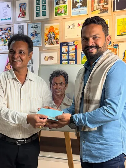 Presenting the completed portrait to my mentor, Dr. Sanjay Bharti. It is a special joy when a student gets to draw a portrait of his guru.