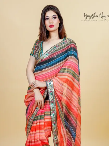 A classic portrait from the ethnic brand shoot. The pink glam makeup adds a modern touch to the timeless beauty of the saree.