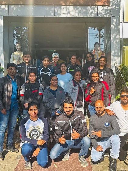 A group photo outside a restaurant during a breakfast ride. It's a great way to socialize and meet other women riders.