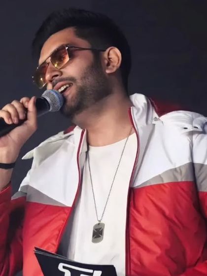 A close-up of me on the mic during the Techfest concert, feeling the music and the energy of the crowd.