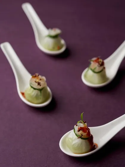 Steamy, dreamy, and oh so savory. These beautifully crafted dumplings are served in individual spoons, making them an elegant and easy-to-eat appetizer.