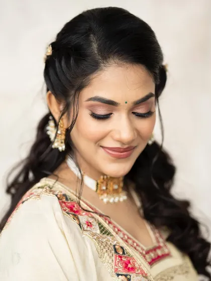 A final close-up of Supriya's Mehendi makeup, showing the soft pink tones and the beautiful, natural finish on her skin.