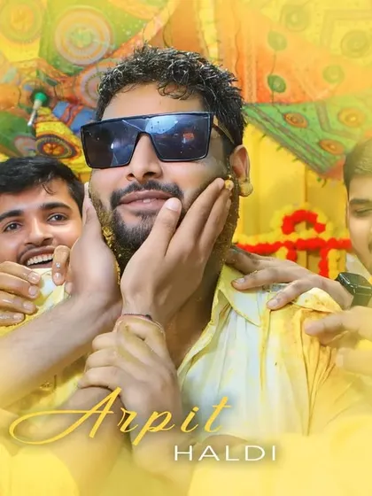 Haldi-kissed smiles and hearts full of love. The groom looking cool in sunglasses during his fun-filled haldi ceremony.