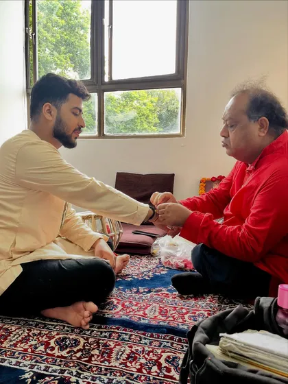 The 'Ganda-Bandhan' ceremony, where the guru ties a thread around the disciple's wrist, symbolizing the formal acceptance into the musical lineage.