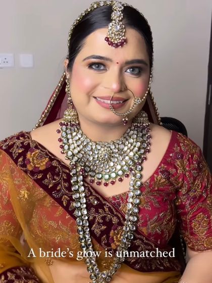 A close-up shot that captures the bride's beautiful smile and glowing skin.