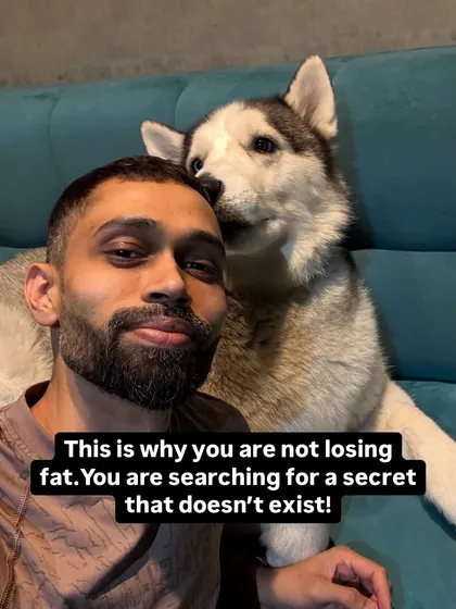 A selfie with my dog, with a direct message: you're not losing fat because you're searching for a secret that doesn't exist. The secret is consistent effort.