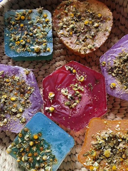 An assortment of my hexagonal and heart shaped Chamomile soaps, showing the variety in design.