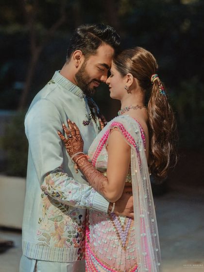 A romantic close-up of the couple from the carnival event.