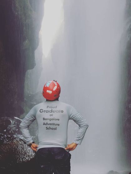 A graduate looks towards the next challenge. Our courses are designed to empower you for a lifetime of exploration.