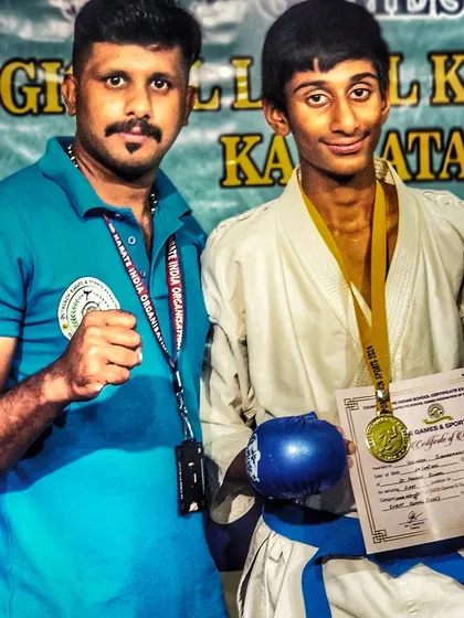 This is a moment of pride. Standing with my student after he won gold at the state championship and qualified for the nationals. This is the result of relentless hard work and dedication.