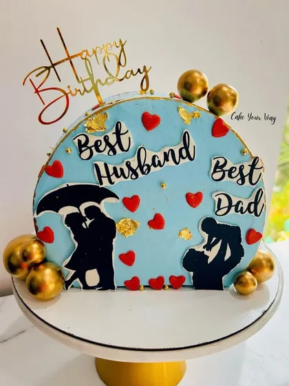 The most trending design. A fault-line cake celebrating the "Best Husband" and "Best Dad."