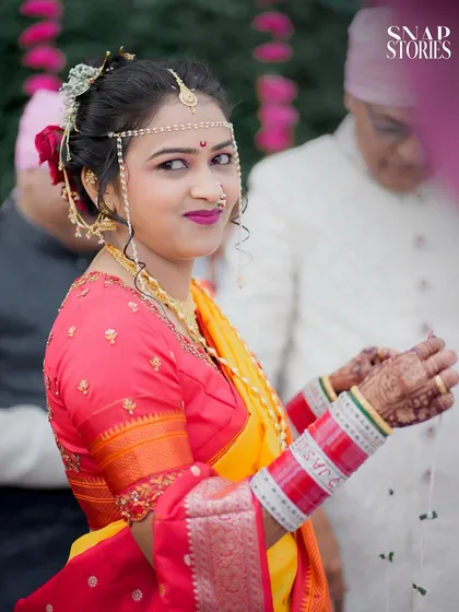 A candid portrait of the bride, looking back with a gentle smile. We focus on capturing the bride's natural beauty and personality during the wedding festivities.