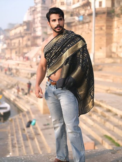 Embodying the energy of the city with Shiva in my soul. This portrait channels the raw, powerful vibe of Banaras, blending modern denim with a traditional 'Om Namah Shivaya' drape.