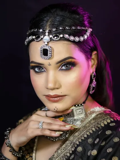 A close-up of the oxidized jewelry look, showing the intricate details of the headpiece and the beautiful blend of the eyeshadow.